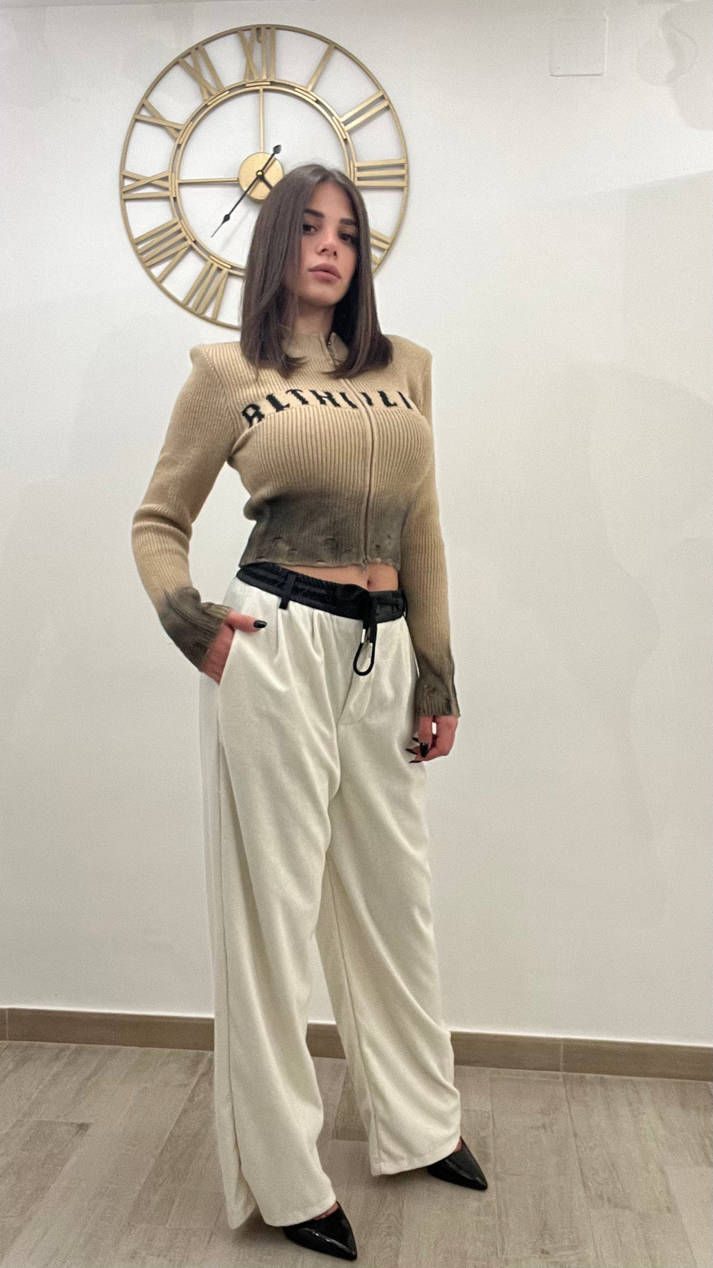 Pantalone di lana                                   Con bustino di ecopelle
