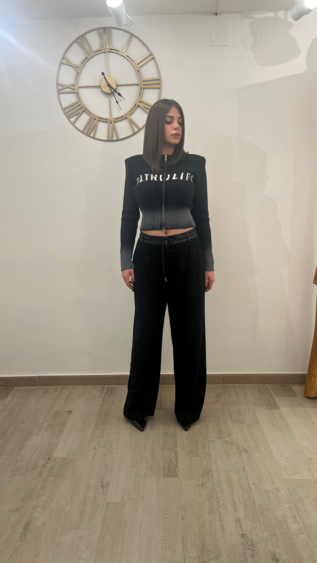 Pantalone di lana                                       Con bustino di ecopelle